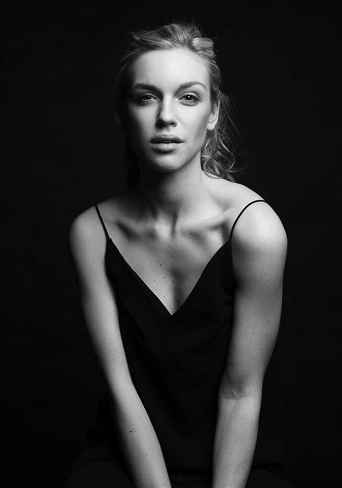 Laura L.